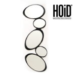 Abstract wall-hanging mirror with oval shapes.
