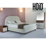 Bed with side table