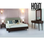 Bedroom furniture set featuring a patterned bed, two side tables, one dresser, and one mirror.